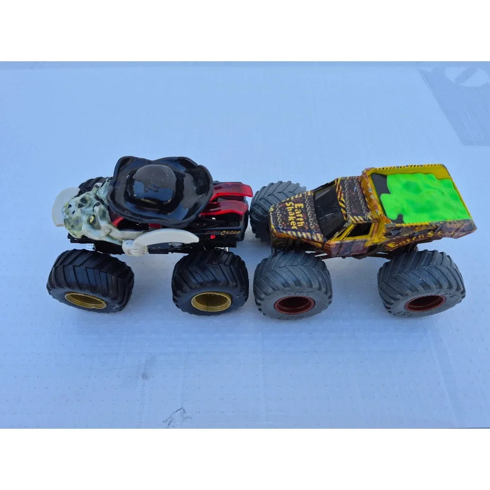 Monster Jam Pirates Curse and Zombie vs Hunter Earth Shaker Die-Cast Truck Lot